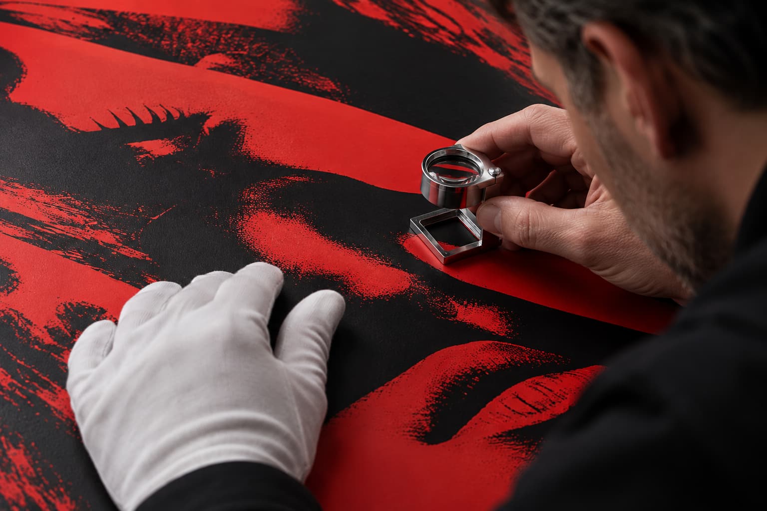 Close-up concept of a print specialist inspecting a finished graphic