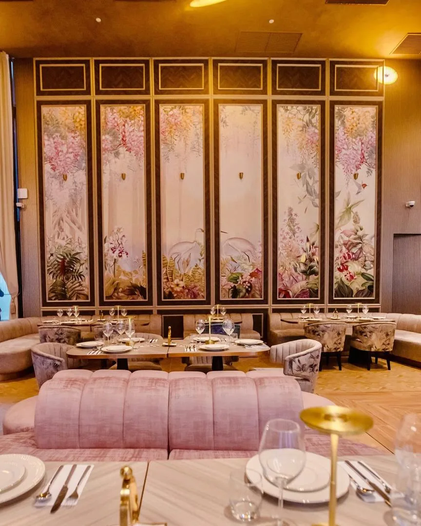 Annabell restaurant interior with floral feature walls, upholstered seating and bespoke finishes